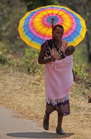 malawi_woman_w_rainbow_umbrella_cs_9891.jpg